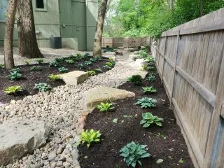 Professional drainage creek bed installation